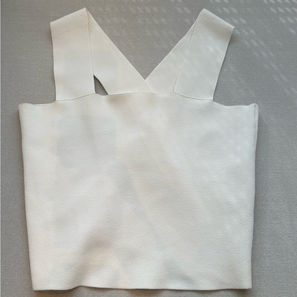 White sleeveless A.L.C. crop top shirt. Size M but stretchy fabric.